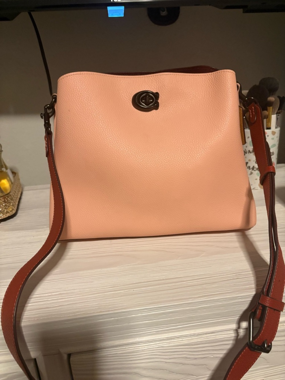 Peach Leather Coach Crossbody Bag with Adjustable Strap